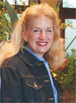 Kathleen Edwards, Jens Cramer, and Erin Anding form the successful team at  Estate Realty International of Bonita Springs, Naples and Miami