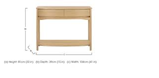 I would suggest finding a sideboard or narrow buffet table to use as an entryway console. Shades Console Table Nathan Furniture Village