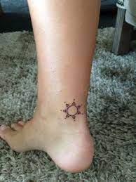 Heart and peace sign tattoos on foot. 22 Small Sun Tattoo Ideas For Ladies Styleoholic