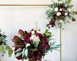 (any personal flowers being delivered to the venue at the same time as centrepieces would be included in this cost.) Altar Flowers Etsy