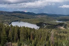 Check spelling or type a new query. View Point On Grand Mesa National Forest Colorado Has Over 300 Lakes Partial Rainbow Above Island Lake Which Is One Of The More Popular Destinations On The Grand Mesa Stock Photo Picture