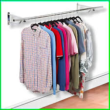 An english, steel and oak retail display stand in industrial taste, dating to the 20th century. Wall Mounted Clothes Hanging Rail For Sale In Uk
