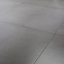 The house was built in the late fifties and the slab floor has been painted at least once. Konkrete Grey Matt Modern Concrete Effect Porcelain Wall Floor Tile Pack Of 8 L 307mm W 617mm Diy At B Q