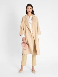 Finding a great camel coat is an essential part of every woman's shopping list. Wool Coat Camel Weekend Max Mara