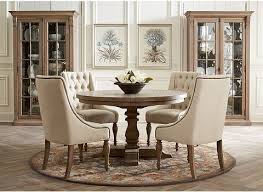 I Like These Club Chairs And Pedestal Table The Neutral Palette Is Calming But I D Like To Round Dining Room Table Round Dining Room Formal Dining Room Sets