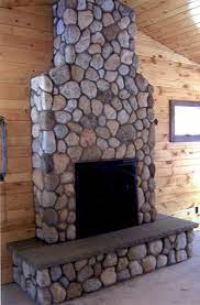 I've included five important things to consider when designing a stone fireplace: River Rock Adirondack Natural Stone Llc River Rock Fireplaces Rock Fireplaces Home Fireplace