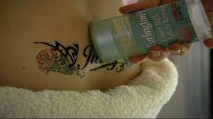Watch saturday night live highlight 'tattoo remover' on nbc.com Saturday Night Live Turlington S Lower Back Tattoo Remover Lower Back Tattoos Tattoo Removal Cost Full Body Tattoo