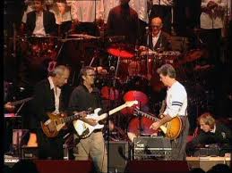Mark Knopfler Eric Clapton Sting Phil Collins Live Montserrat Pin On Music Videos