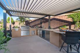 Check out these hot new outdoor kitchen pergola ideas to add to your backyard barbeque space! Covered Outdoor Kitchen Outdoor Elements