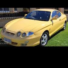 Image result for Pastel Yellow 2000 Tiburon
