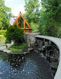 Ivy grew along the outer walls of the building. Oakton Landscape Design With Greenhouse Koi Pond Surrounds Landscape Architecture