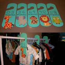 Nursery organization diy for baby s closet. Diy Baby Clothes Dividers Bought The Clothes Dividers From Dollarama They Were Actually Black Chalkboard Door Ha Diy Baby Stuff Diy Baby Clothes Baby Hangers