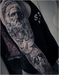 Tattoo Guys Christian Themed Jesus And Dove Full Sleeve Tattoo Ideas Click To See More Full Sleeve Tattoos Sleeve Tattoos Full Sleeve Tattoo Design
