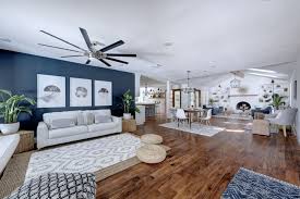 Home Remodel Acacia Wood Floors Dark Blue Walls Open Concept To Living Dining And Kitchen H Wood Floor Dining Room Dining Room Blue Dark Blue Dining Room