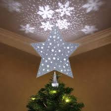 For years it has been a tradition amidst most christians to use either star or angel or from unique star designs to ribbons to unique christmas tree toppers like emoji stars or flower toppers to others. Amazon Com Lighted Christmas Tree Topper Star Yunlights Christmas Tree Star With Led Rotating Snowflake Projector Lights 3d Glitter Hollow Xmas Tree Topper For Holiday Christmas Decorations Silver Kitchen Dining