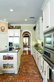 Brick kitchen flooring mit eingelegten kiefernbalken. Old Brick Floors And Gleaming Granite Countertops Make For A New Orleans Style Kitchen Description From Cy Fairlif Brick Floor Kitchen Sweet Home Brick Floors