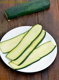 Black zucchini, where the skin is dark green, and the fruit has white flesh. What Is Zucchini Glossary Benefits Uses Recipes With Courgette