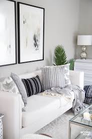 Beautiful pine engineered wood floors is the center of attention in this lovely interior. Living Room Makeover New Tv Stand Wall Art Rug Pillows Setting For Four