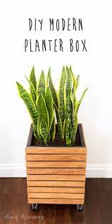 It's easy to modify the height or width of this key west style diy wood planter to fit your space. Diy Modern Planter Box Stacy Risenmay Diy Planter Box Modern Planters Planter Boxes