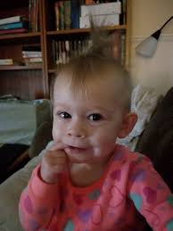 He's thinking is it her natural hair or does she coloured it