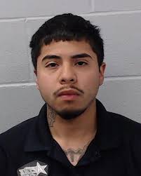 Camacho, Adrian was booked into the Hays County Jail