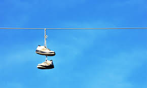 Theres been speculation that the balls weigh down the lines for wind control. Ever Seen Shoes On Power Lines Here S Why Footfiles
