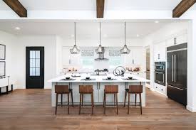 This produces a very modern kitchen design with an expansive countertop that serves as a casual eating spot as well as a practical worksurface for food prep. 29 Ideas For The Perfect Kitchen Island With Seating Build Beautiful