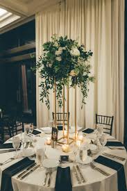 A Rooftop Wedding In Savannah To Ring In The New Year Flower Centerpieces Wedding Tall Wedding Centerpieces Wedding Floral Centerpieces