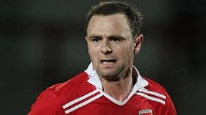 Burscough boss Mark Beesley ready to cross Bamber Bridge in FA Trophy