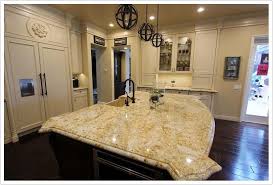 This has bright gold spashed over a deep yellow background with non uniform brown spots spread in parts. Colonial Gold Granite Bath Granite Denver