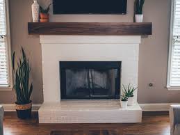 Amazing white brick revealed fake fireplace with do it yourself mantel. Painted Brick Fireplace Ideas Alexander And Xavier Masonry