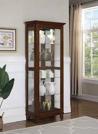 Our lockable door provides added security. Traditional Style Curio Cabinet With Sliding Glass Doors