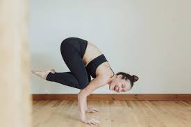If it isn't possible to keep your heels on the floor, support them on a thickly folded blanket. Posture Clinic Bakasana Fern Ross Yoga