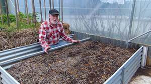 The raised garden beds also provide easy drainage you can usually buy inexpensive top soil at a nursery, or garden supply store if you have a pickup truck to haul it. Safe And Low Cost Raised Garden Beds Youtube