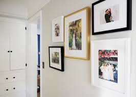 Framing photos is a very inexpensive way to make your house a home. Mini Home Updates For Fall A Family Photo Gallery Wall Coco Kelley