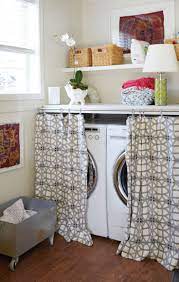 15 Laundry Spaces That Cleverly Conceal Their Unsightly Appliances Laundry Room Decor Stylish Laundry Room Laundry In Kitchen