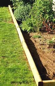 Learn How To Install Landscape Timber Edging Landscape Timber Edging Landscape Timbers Timber Garden Edging