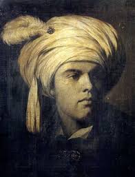 Portrait of a gentleman wearing a turban and a cloak with decorated clasps  by Joseph Wright (of Derby)