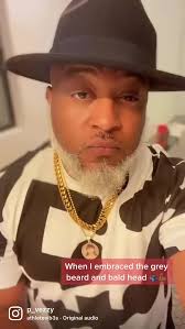 Man with Gray Hair and Short Bushy Gray Beard Comedian