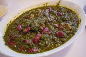 Make a couple of small holes in each of the dried limes. Iran Ghormeh Sabzi Food Touring