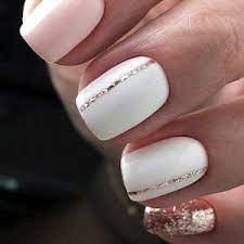 Las uñas rojo clásico nunca fallan con unos labios del 4. Unas Blancas Decoradas Ideas Para Inspirarte 2021