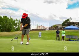 Chief Master Sgt. Robert Devall, former Space Base Delta 2 command chief,  addresses Team Buckley during a commander's call May 26, 2022 at Buckley  Space Force Base, Colo. Devall reminded the team