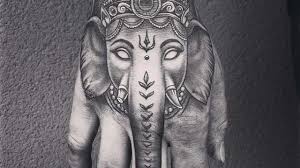 Plus, you can always get these amazing creatures tattooed with a flower for an elegant feminine look or focus on a black and white african elephant face for a bold finish. 50 Amazing Elephant Tattoos With Meanings Body Art Guru
