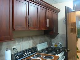 A small kitchen with wooden cabinets. 25 Fabulous Pantry Storage Ideas Slodive