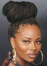 Cornrows are often formed in simple, straight lines, like their namesake, but they can box braids can be worn loose or styled into buns or ponytails because the plaits are not attached to the scalp like cornrows. Top 100 Hairstyles For Black Women Peinados Con Trenzas Africanas Peinados Con Trenzas Trenzas Africanas