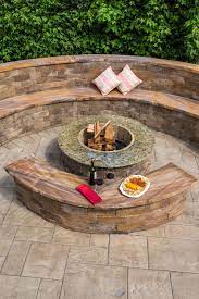 Who Would Love To Be Here This Amazing Outdoor Living Space Features Beautiful Cambridge Pavingstones With Armo Outdoor Fireplace Patio Backyard Paver Designs