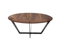 It should almost always be at the same height as your couch (usually 20 inches maximum height). Oiled Round Walnut Coffee Table By Marie Burgos Design And Collection Seen At Private Residence Bachelor Loft Tribeca New York Wescover