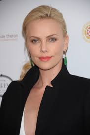 Charlize Theron At Arrivals For Charlize Theron African Outreach Project  Benefit, The Darby Restaurant, New York, Ny December 6, 2010. Photo By: Rob  Rich/Everett Collection Photo Print