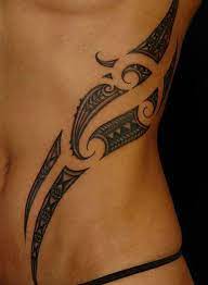 Beautiful tribal tattoo on a female leg. 110 Best Tribal Tattoos For Women And Men
