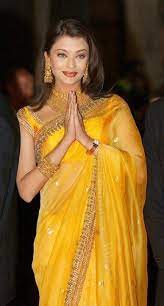 Aishwarya rai bachchan, is an indian actress, model & the winner of the miss world 1994 pageant. Aishwarya Rai In Yellow Saree Indian Celebrities Indian Designer Outfits Bollywood Fashion